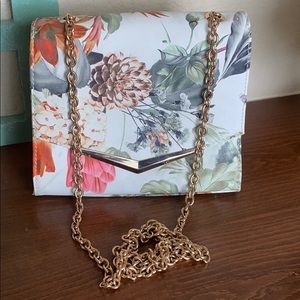 Cross body bag spring